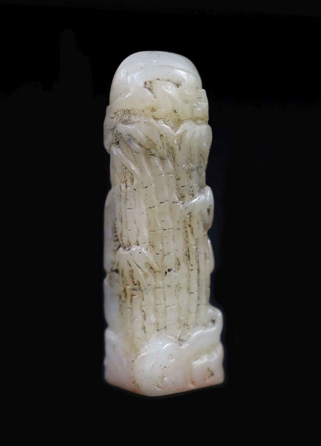 A small Chinese white and grey jade seal, 3.7cm high